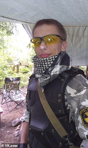 34898384-8884079-A_gun_loving_gamer_named_Artyom_Belenko_36_was_detained_over_the-m-32_1603799515092.jpg