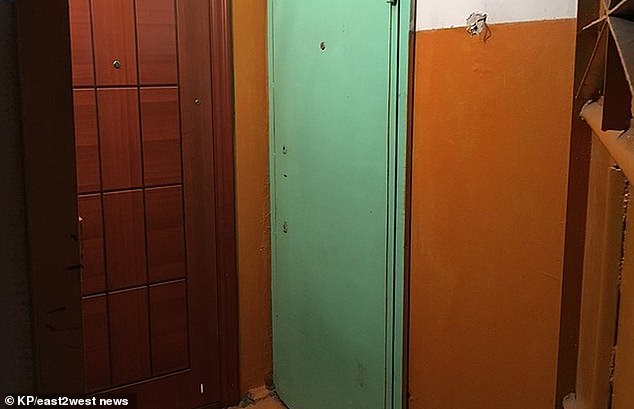 15875420-7233225-This_is_the_green_door_of_the_flat_where_Zhukova_lived_Neighbour-m-62_1562772838456.jpg