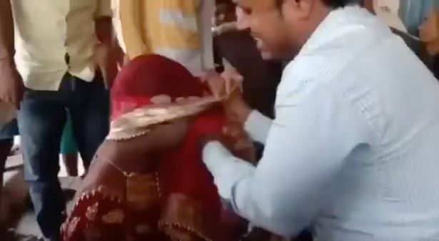 0_PAY-Man-dresses-up-as-BRIDE-to-see-his-secret-girlfriend-on-her-WEDDING-DAY-and-gets-beaten-up-by-gues (1).jpg