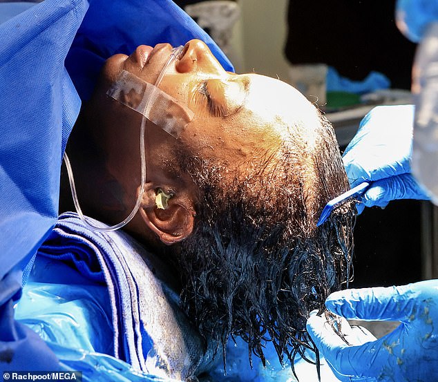 39176576-9249869-Piece_by_piece_Plastic_surgeon_Dr_Michael_Obeng_used_a_custom_fo-m-186_1613064080851.jpg