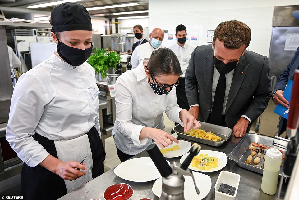 43970991-9664287-Macron_had_been_attending_a_culinary_lesson_during_Tuesday_s_vis-a-44_1623162359573.jpg